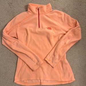 The north face quarter zip up sweater.